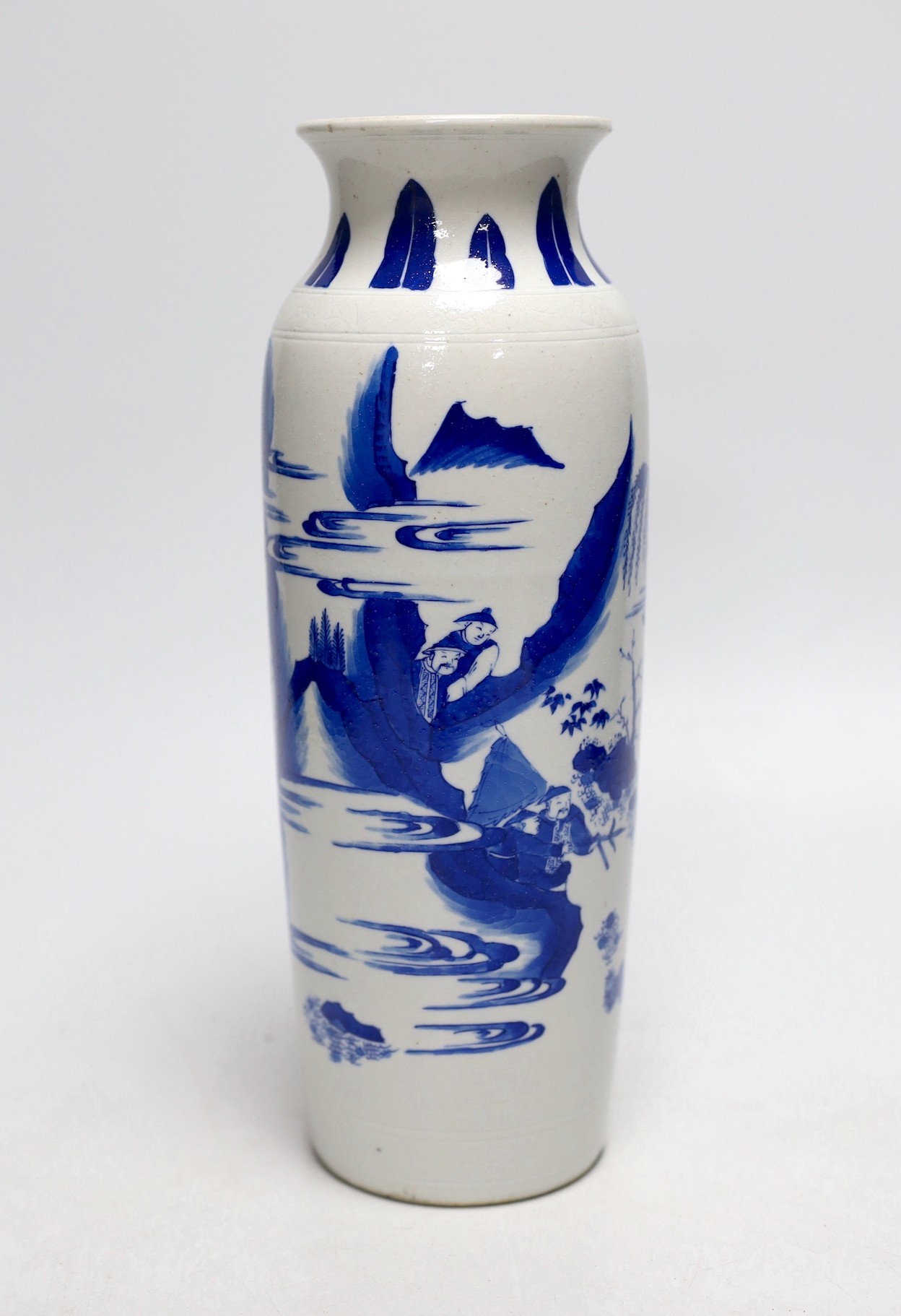 A Chinese blue and white sleeve vase. 26cm tall